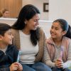 Family of three smiling together after a cavity prevention checkup at a Denville NJ dental office